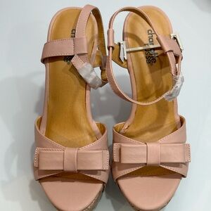 New, never-used size 6 pink Wedges